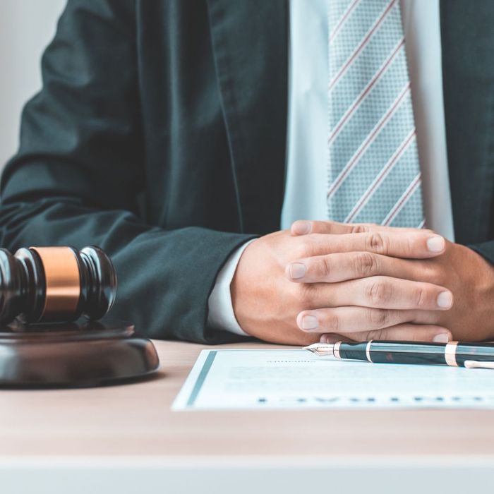 a lawyer sitting at a desk