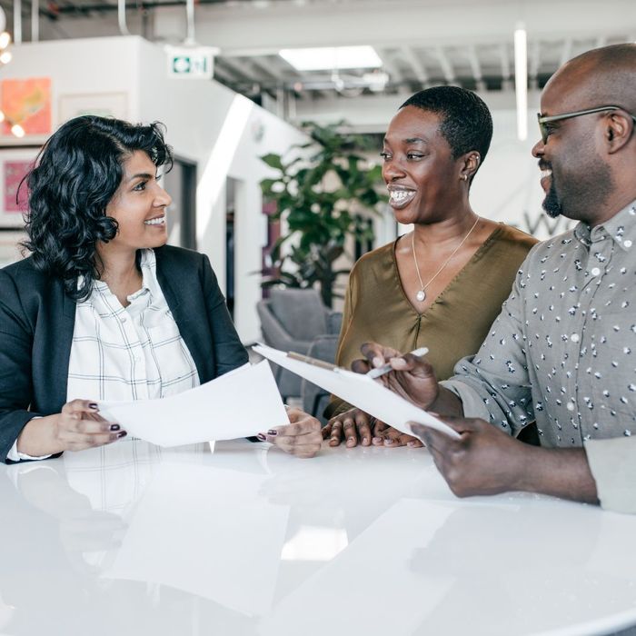 a couple meeting with a lawyer