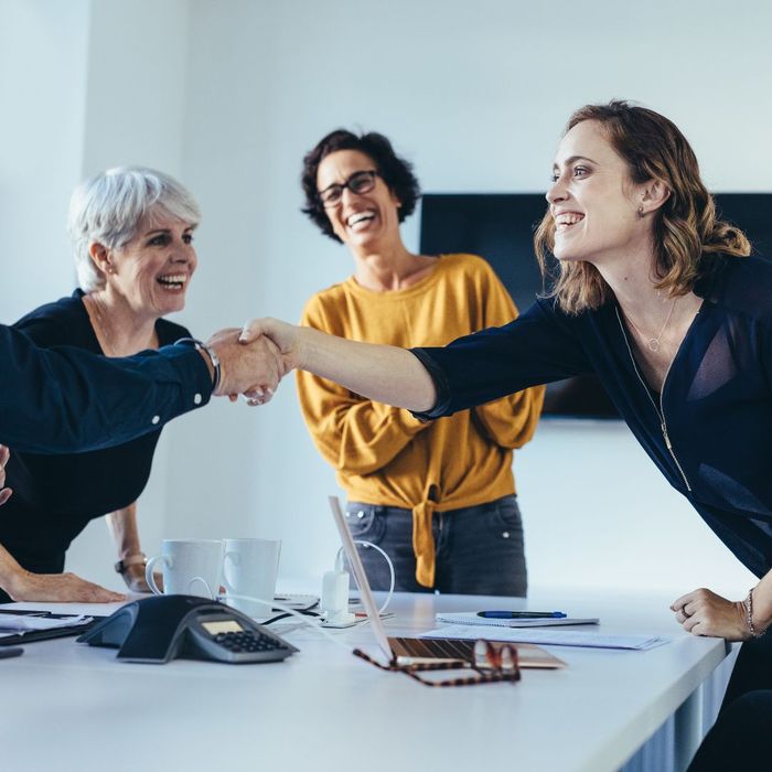 happy group in a meeting room